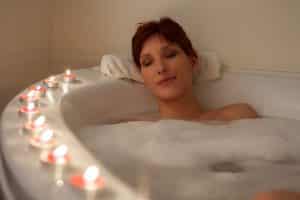 Women relaxing in a bathtube