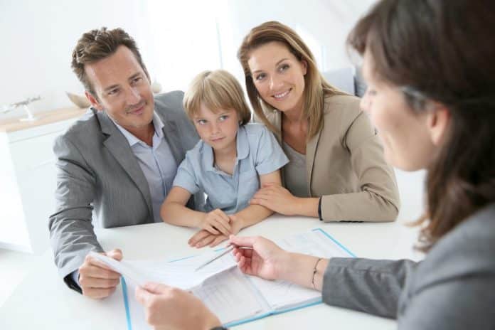 Family meeting real-estate agent to buy new home Canada Mortgage and Housing Corporation