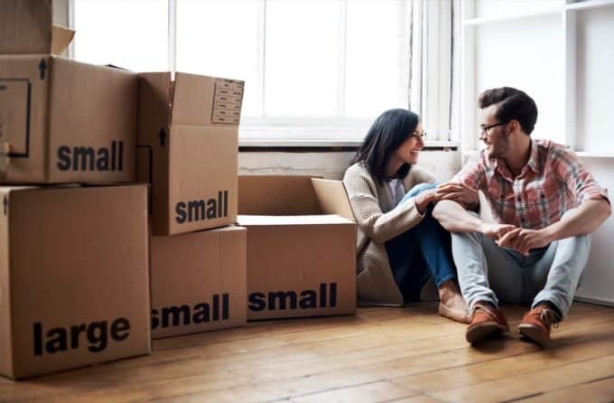 Couple considering helpful moving tips